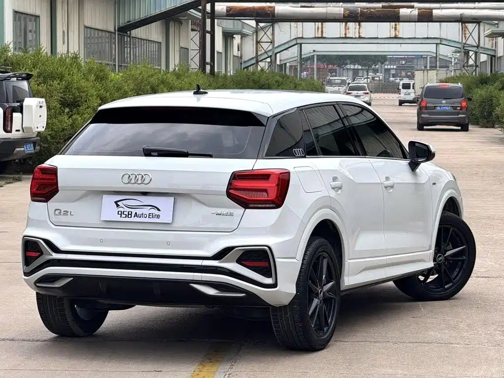 Audi Q2L 2022 — фото 12