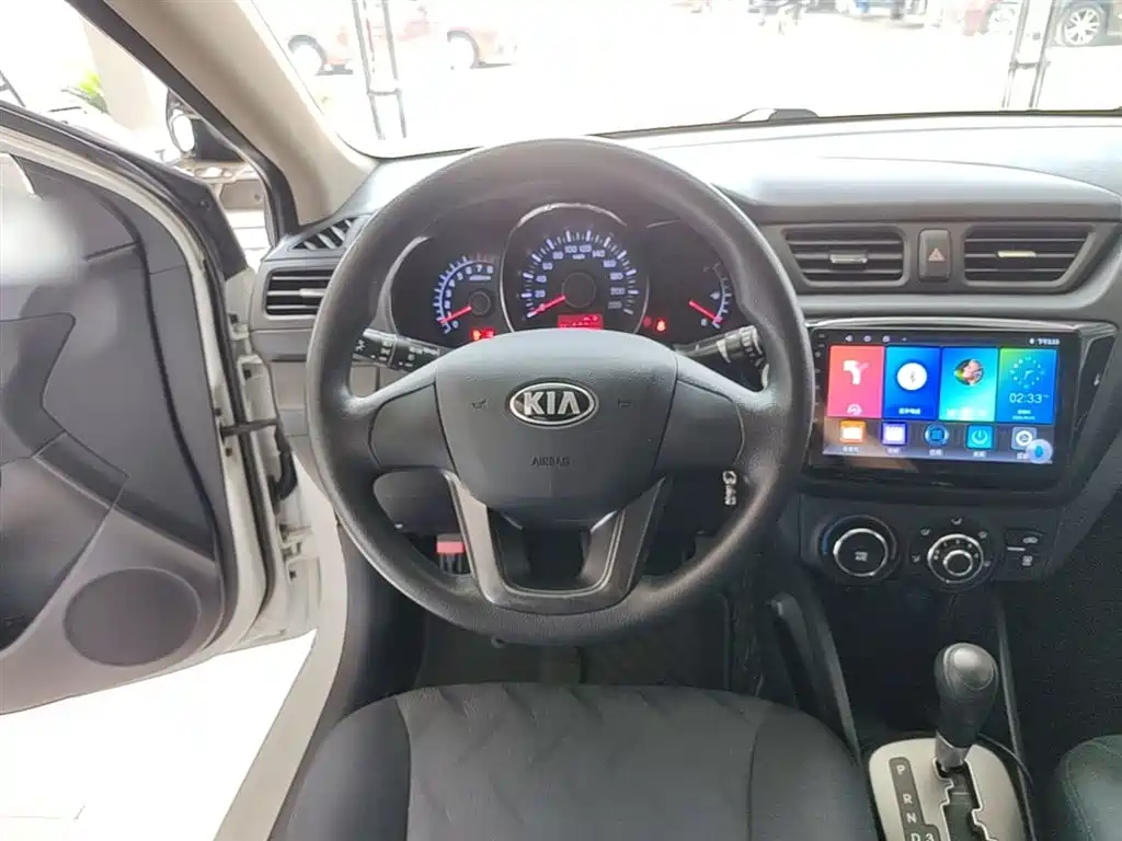 Kia K2 2014 — фото 11