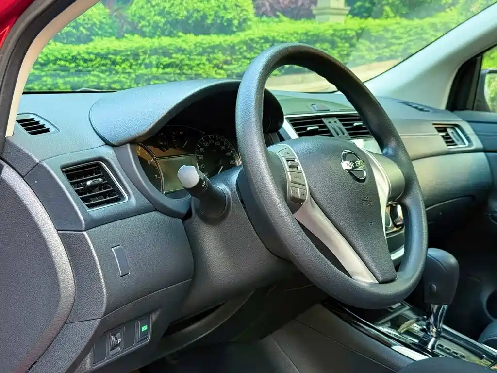 Nissan Tiida 2018 — фото 10