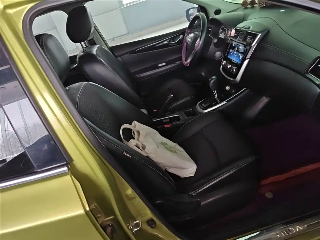 Nissan Tiida 2017 — фото 20