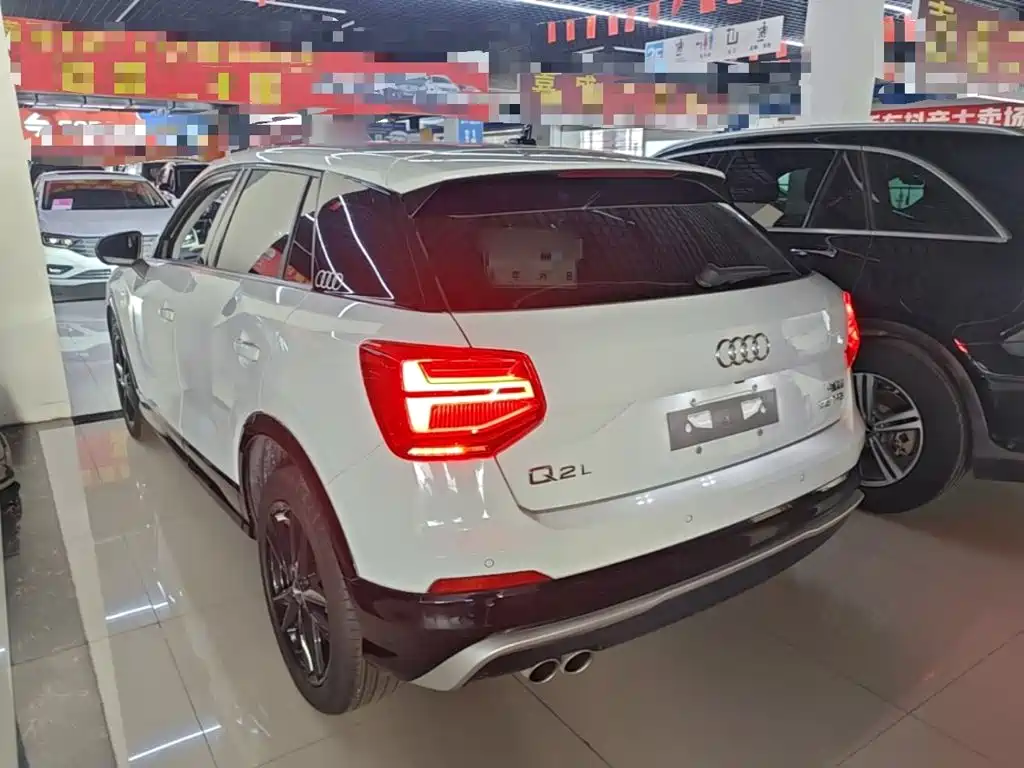 Audi Q2L 2019 — фото 5