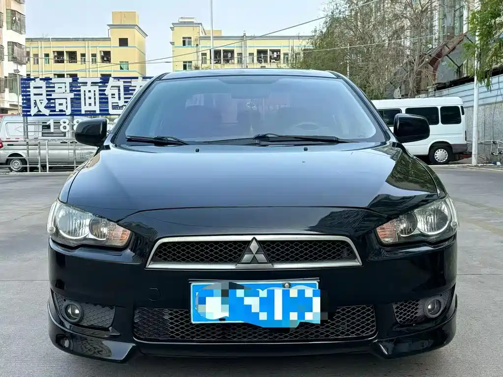 Mitsubishi Lancer EX 2012 — фото 1