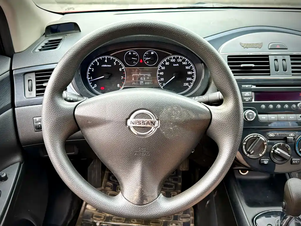 Nissan Tiida 2014 — фото 13