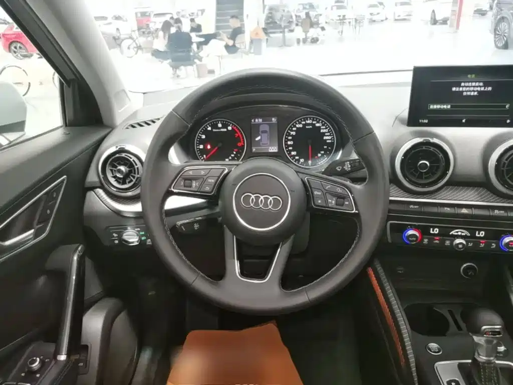 Audi Q2L 2023 — фото 11