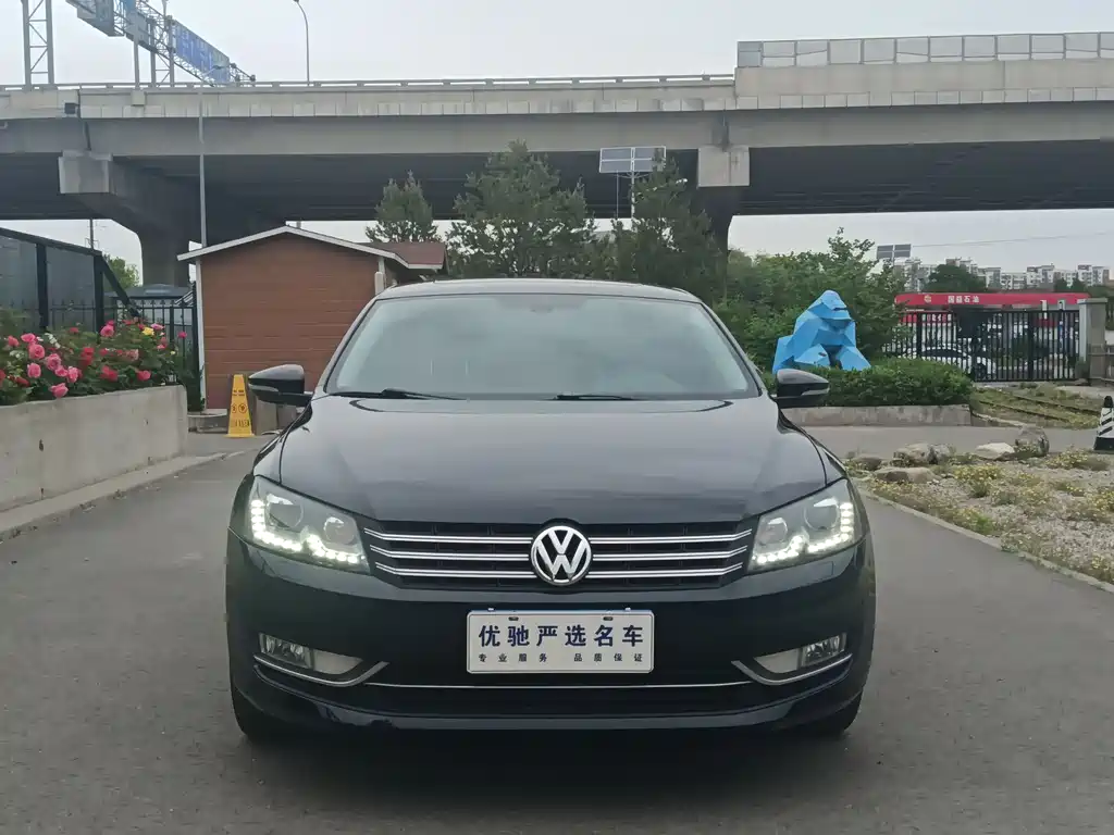 Volkswagen Passat 2014 — фото 2