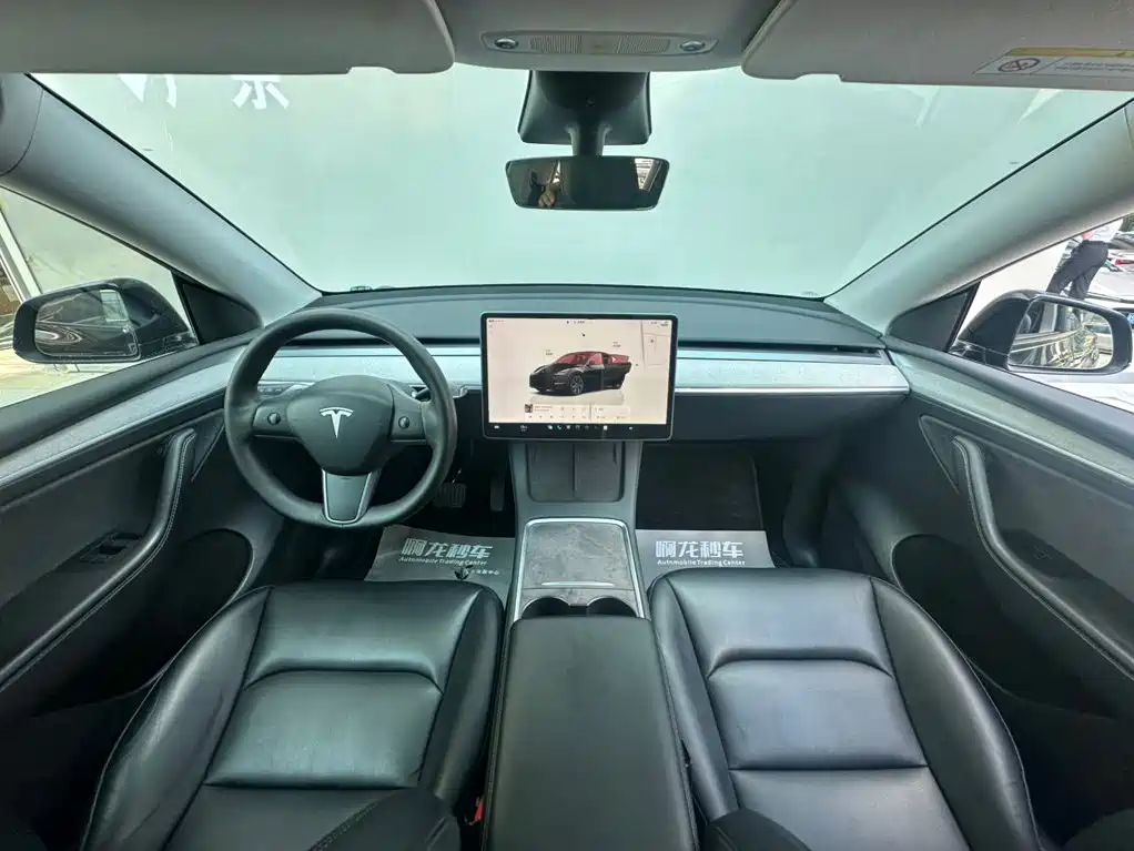Tesla Model Y 2024 — фото 8