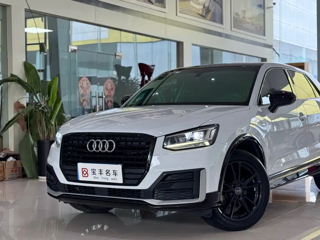Audi Q2L 2019 — фото 12
