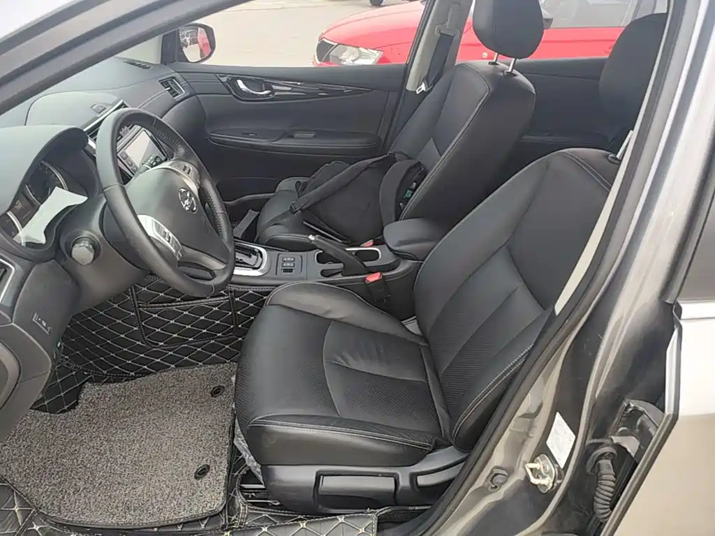 Nissan Tiida 2018 — фото 15