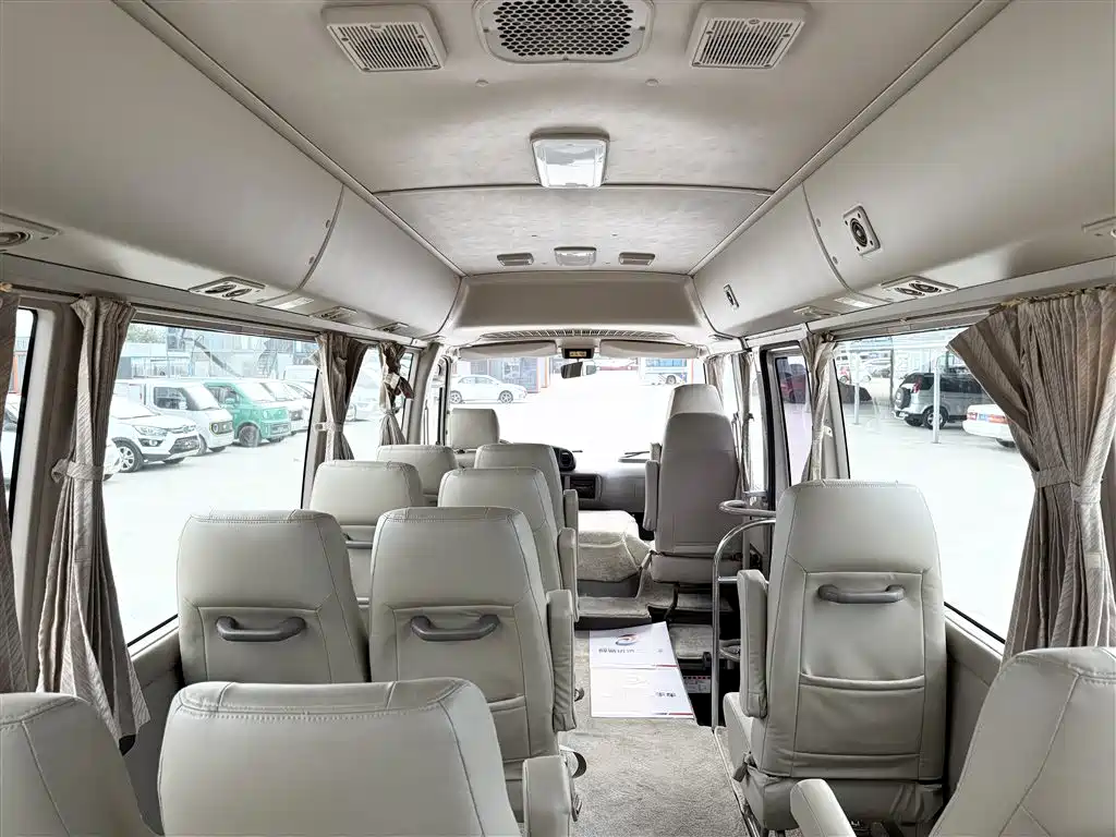 Toyota Coaster 2011 — фото 11