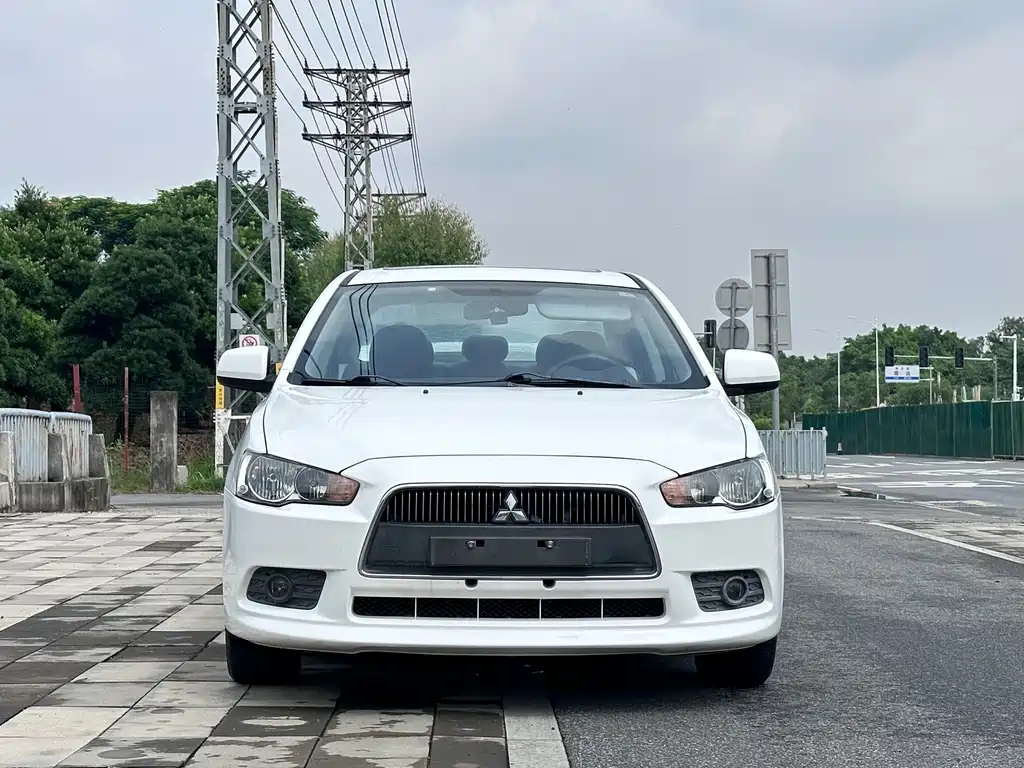 Mitsubishi Lancer EX 2014 — фото 2
