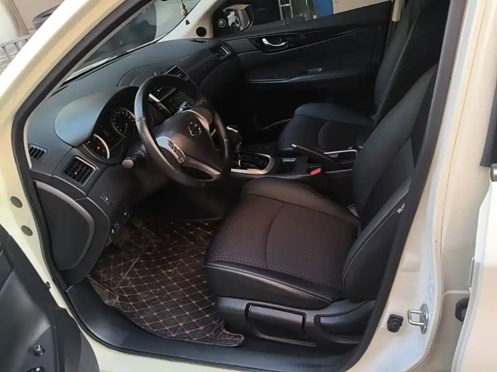 Nissan Tiida 2018 — фото 15