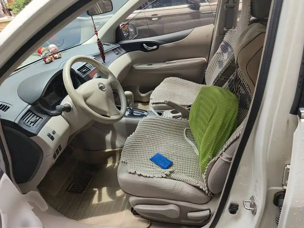 Nissan Tiida 2015 — фото 12