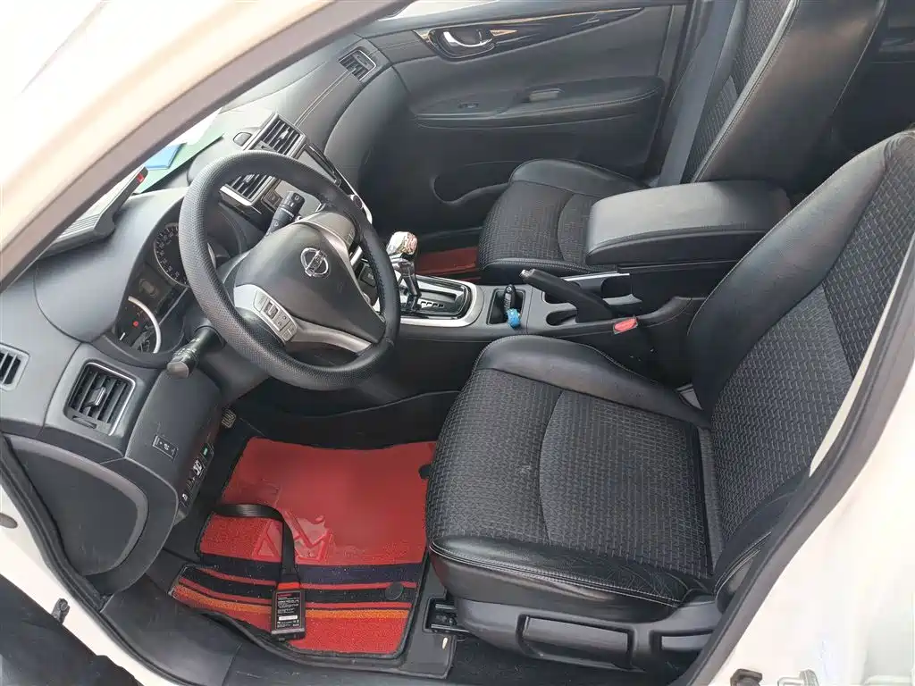 Nissan Tiida 2017 — фото 11