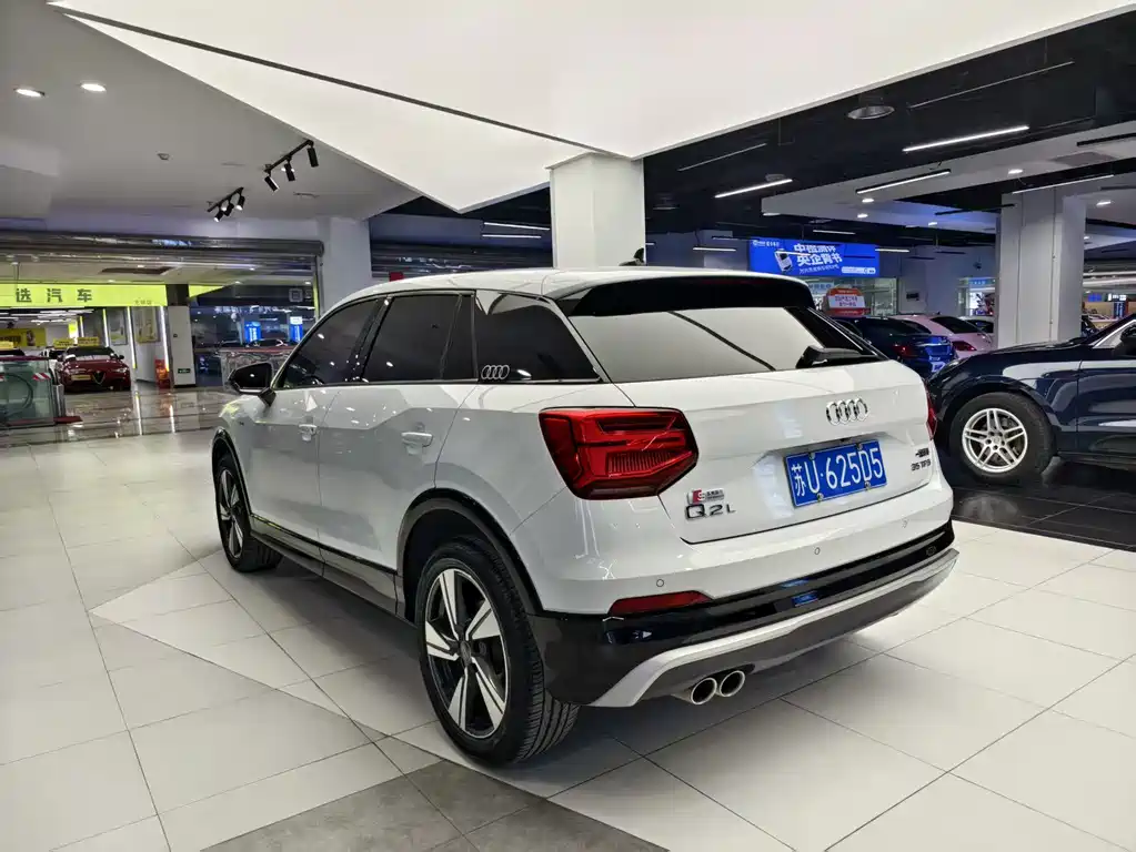 Audi Q2L 2021 — фото 16
