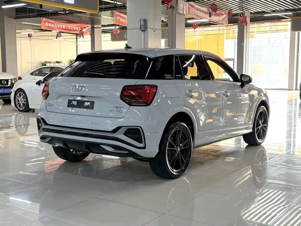 Audi Q2L 2023 — фото 10