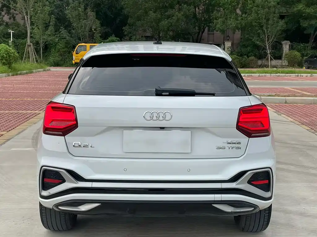 Audi Q2L 2022 — фото 8
