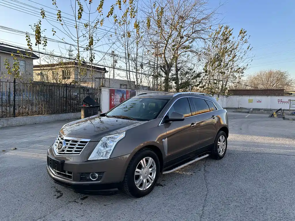 Cadillac SRX 2014 — фото 1
