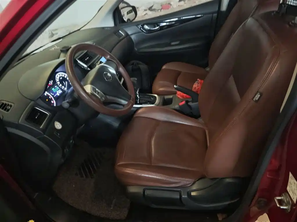 Nissan Tiida 2016 — фото 12