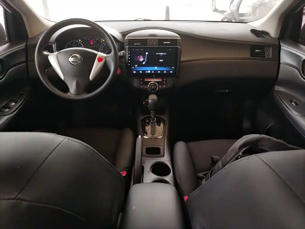 Nissan Tiida 2014 — фото 10