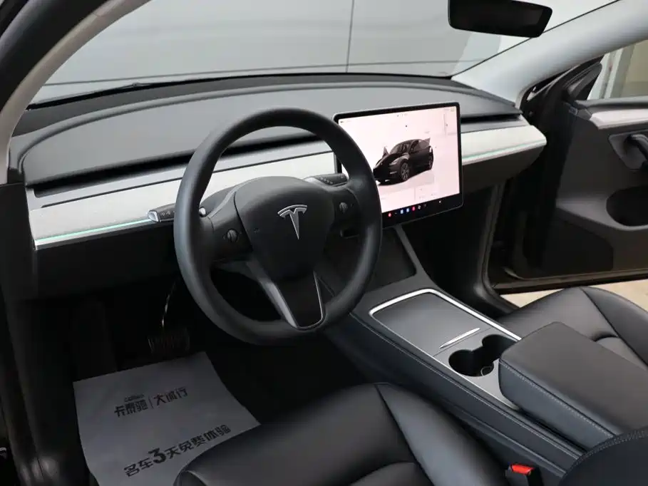 Tesla Model Y 2024 — фото 13