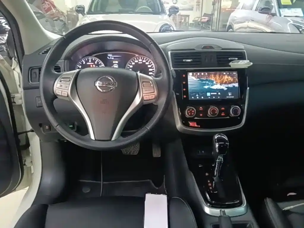 Nissan Tiida 2021 — фото 11