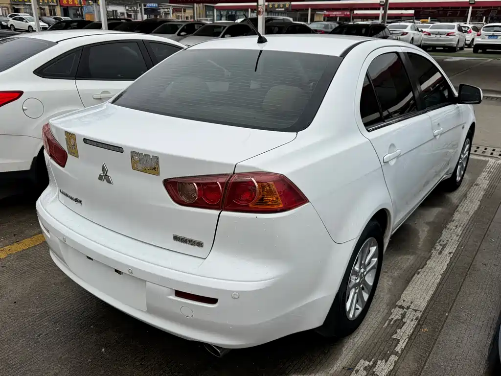 Mitsubishi Lancer EX 2013 — фото 2