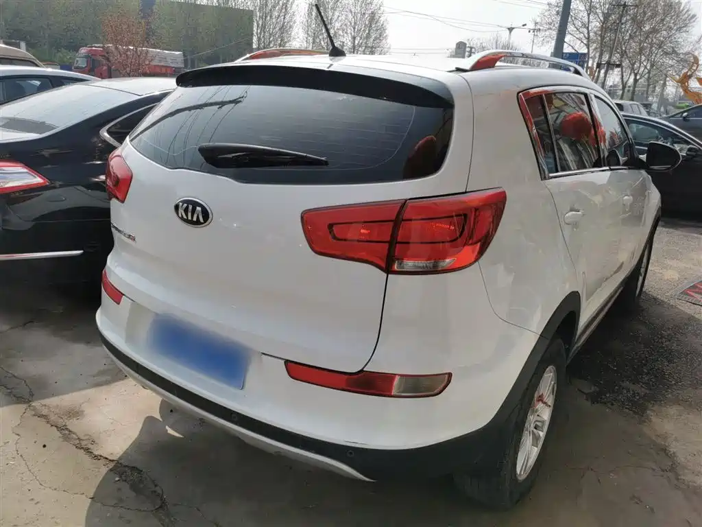 Kia Sportage 2014 — фото 7