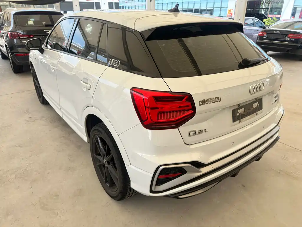 Audi Q2L 2023 — фото 11