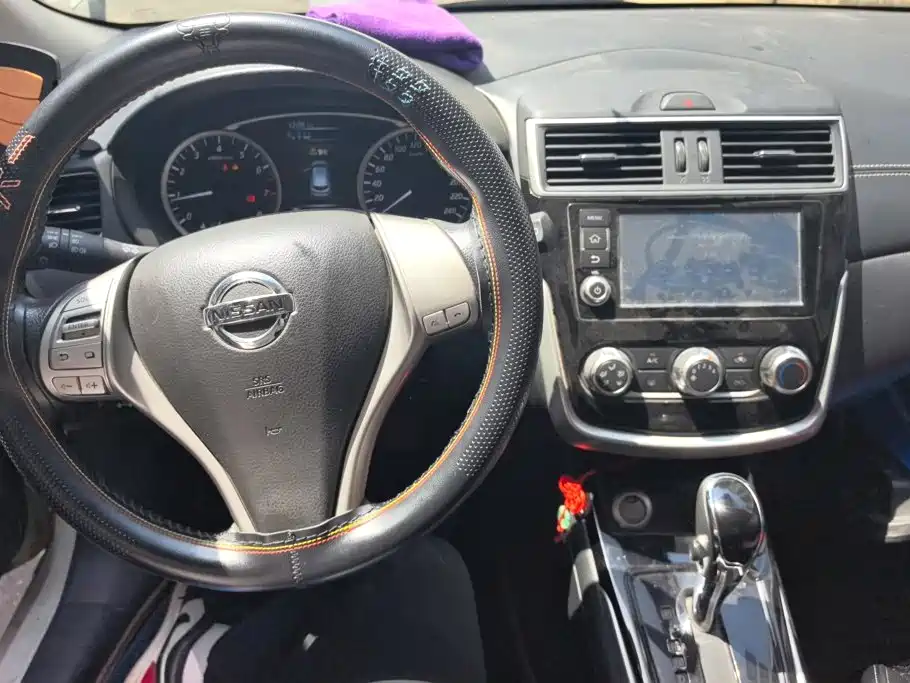 Nissan Tiida 2017 — фото 12