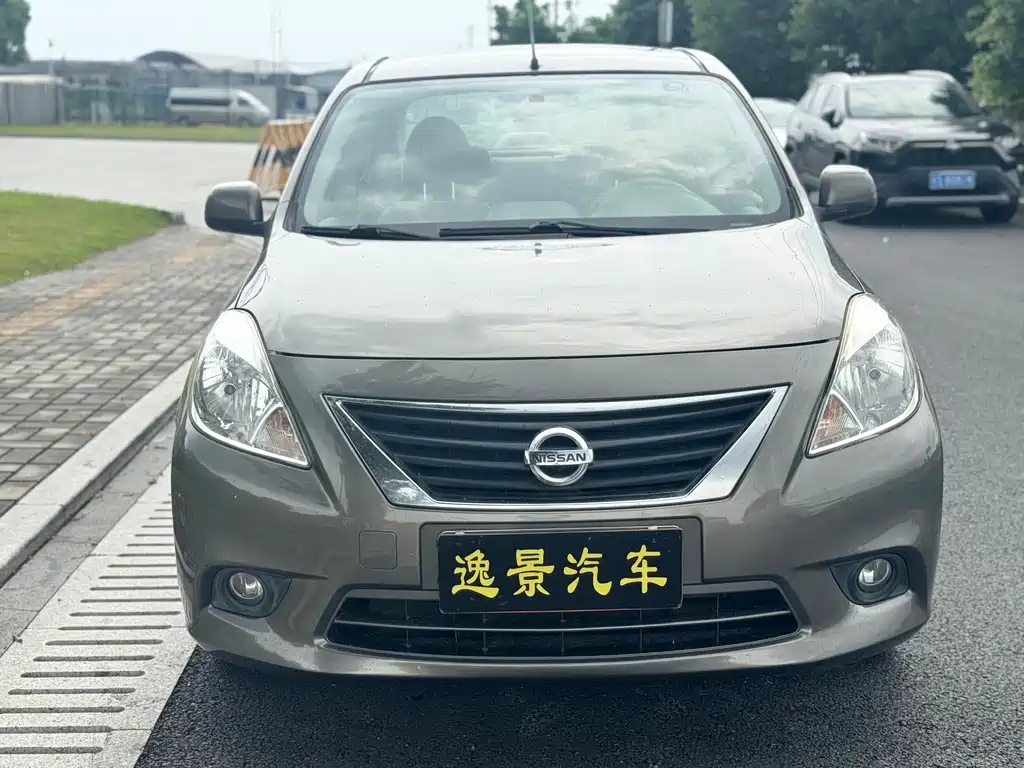 Nissan Sunny 2011 — фото 2