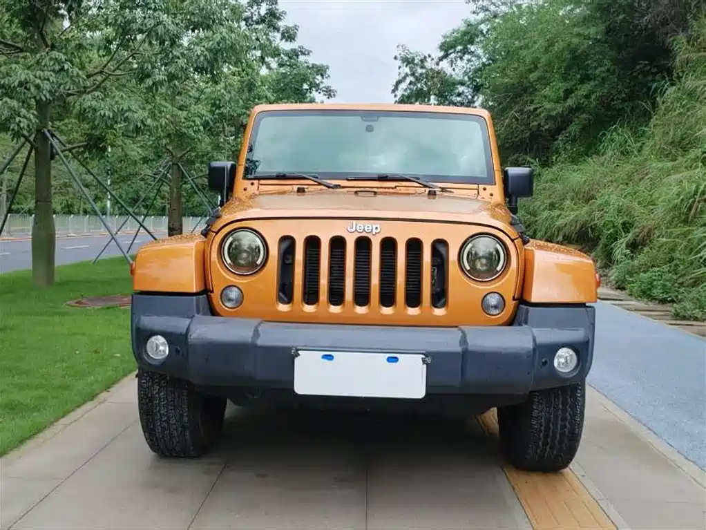 Jeep Wrangler 2014 — фото 2
