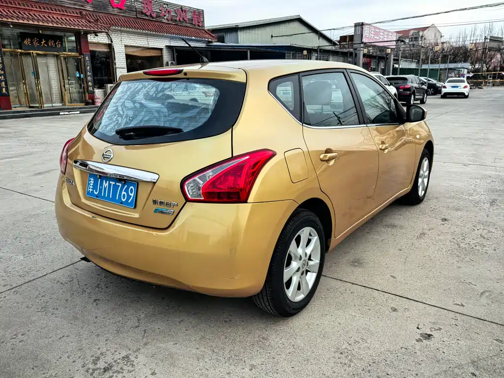 Nissan Tiida 2015 — фото 7