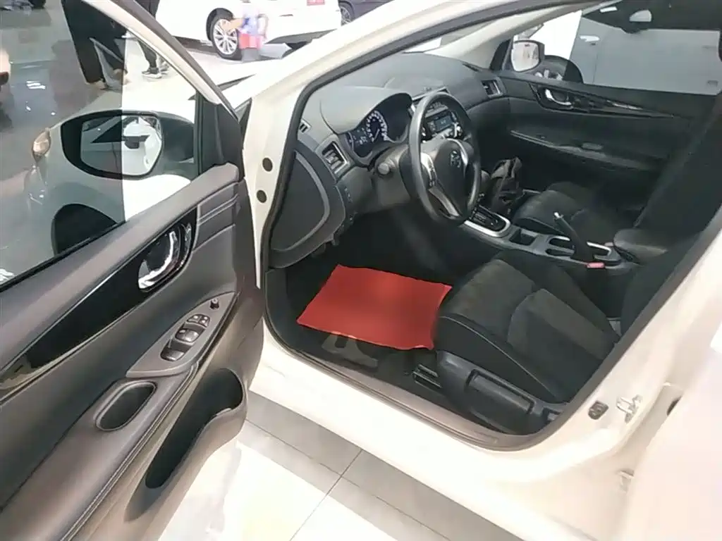 Nissan Tiida 2019 — фото 16