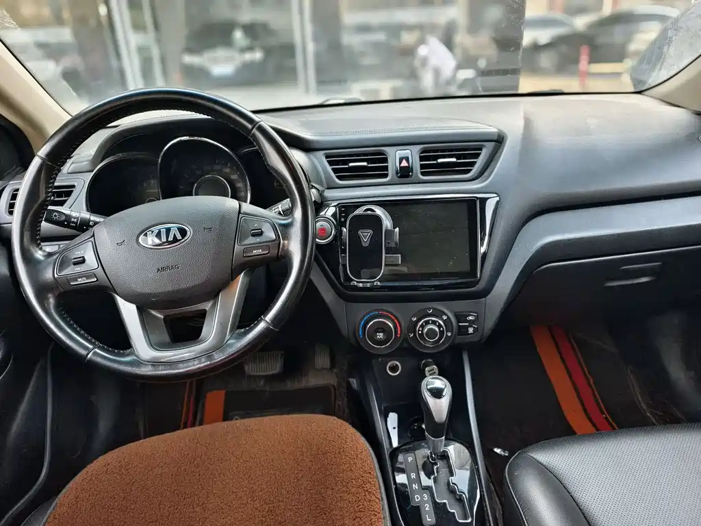 Kia K2 2014 — фото 10