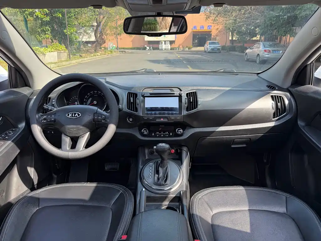 Kia Sportage 2014 — фото 11