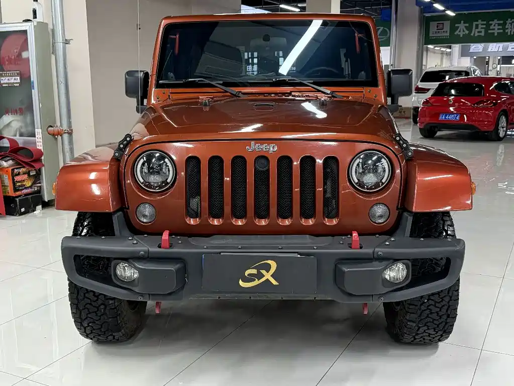 Jeep Wrangler 2014 — фото 2