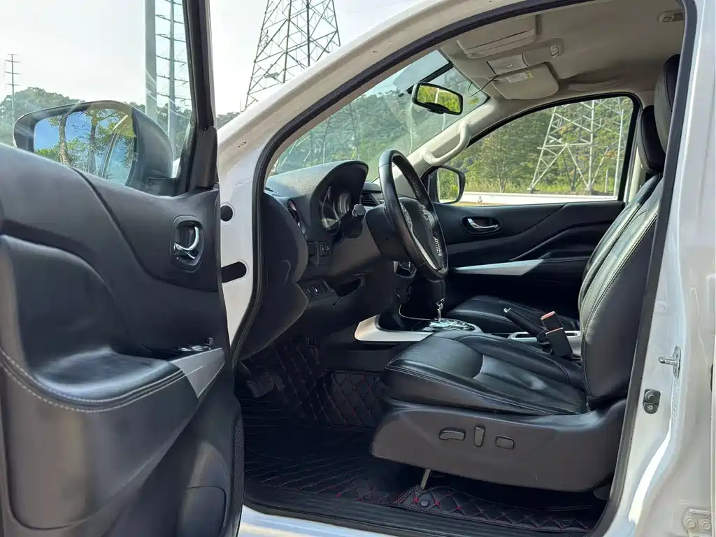Nissan Navara 2022 — фото 10