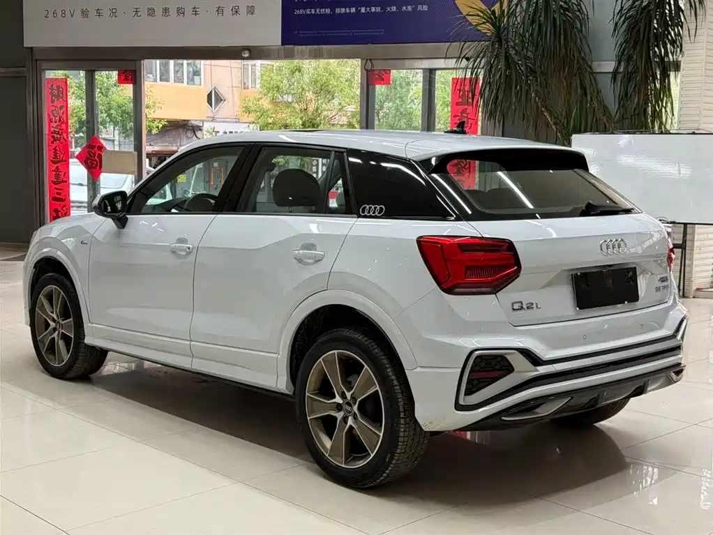 Audi Q2L 2023 — фото 6