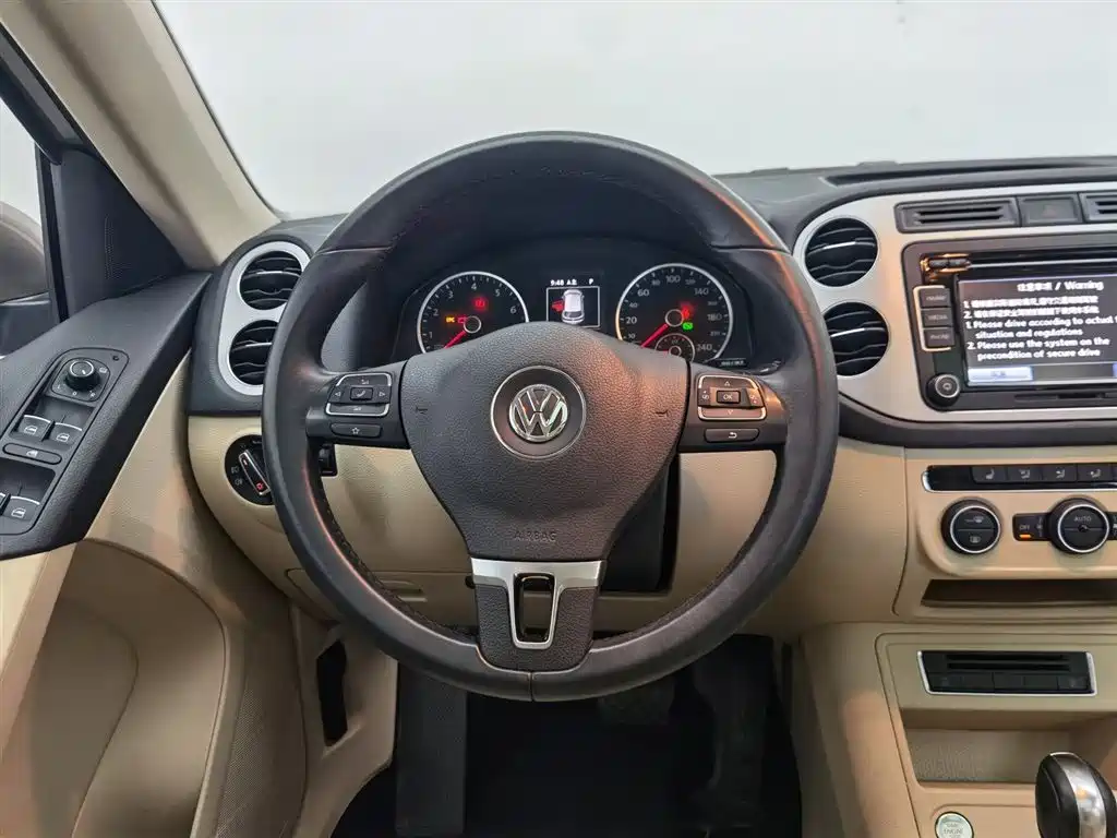 Volkswagen Tiguan 2014 — фото 11