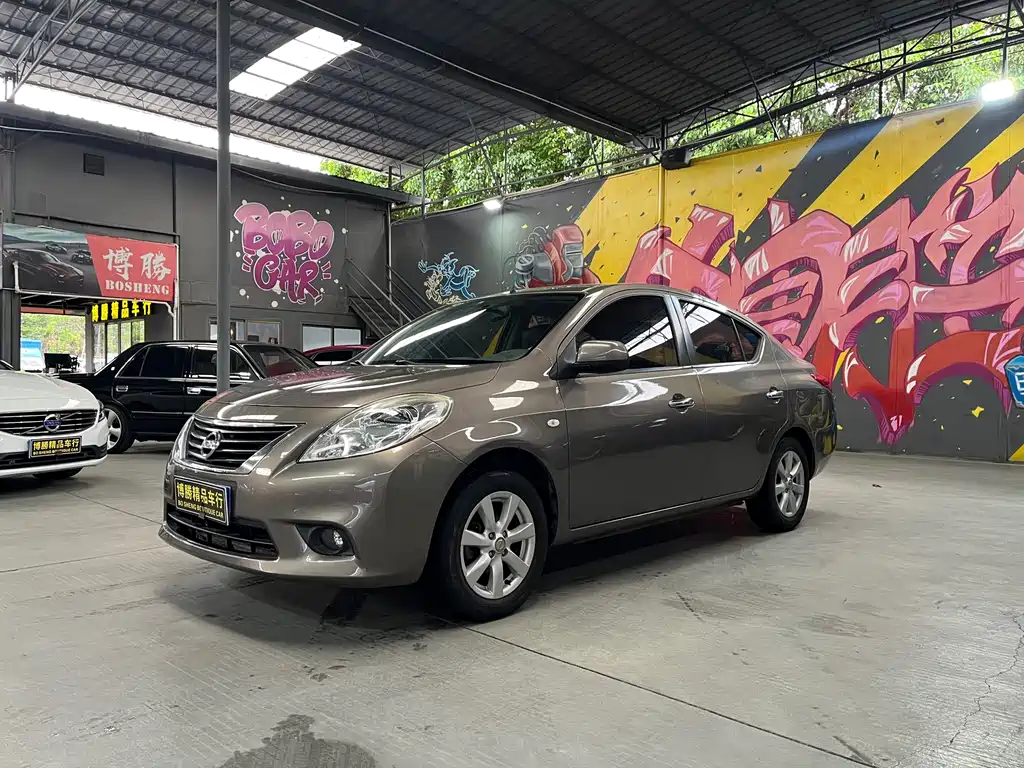 Nissan Sunny 2012 — фото 1