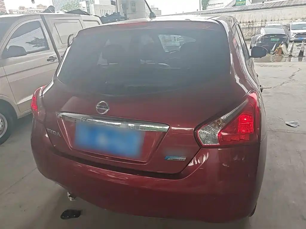 Nissan Tiida 2016 — фото 6