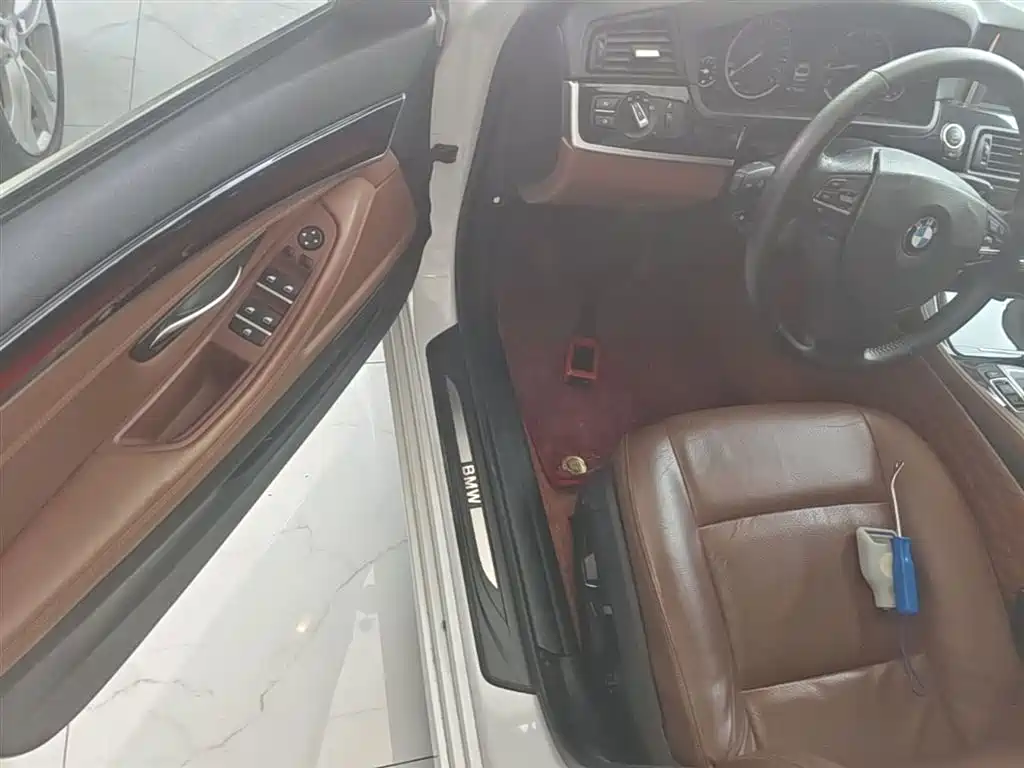 BMW 5 Series 2014 — фото 16