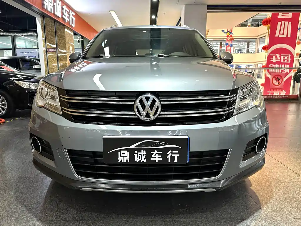 Volkswagen Tiguan 2013 — фото 2