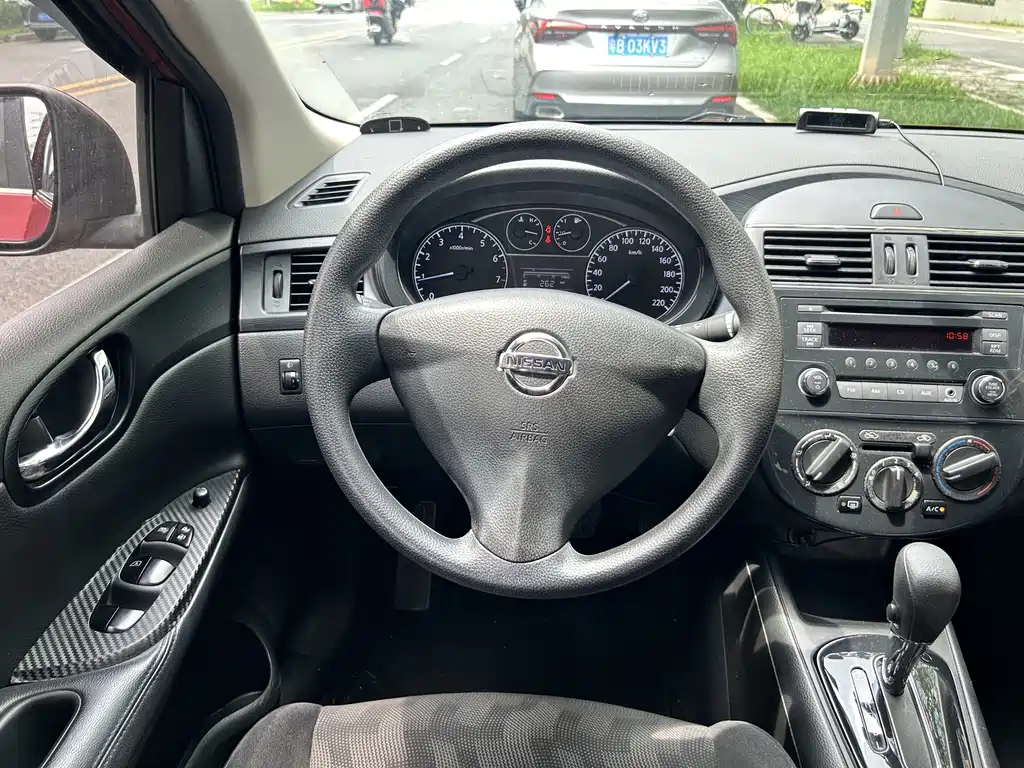 Nissan Tiida 2014 — фото 10