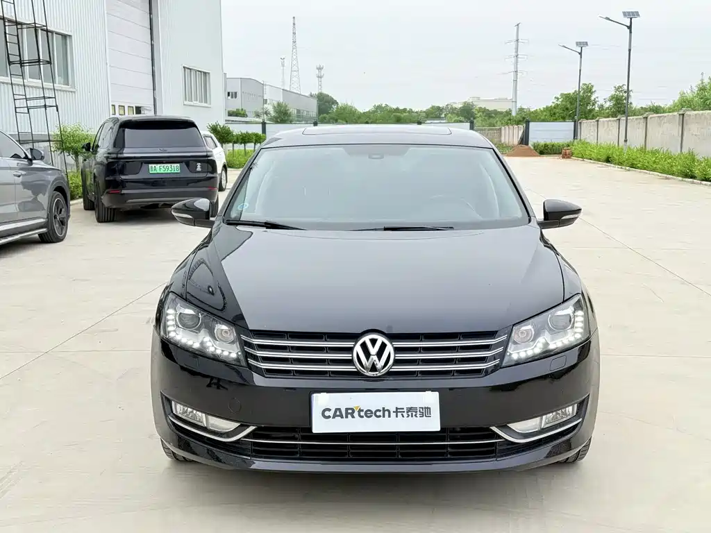 Volkswagen Passat 2014 — фото 2
