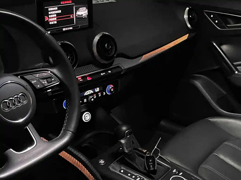 Audi Q2L 2023 — фото 11
