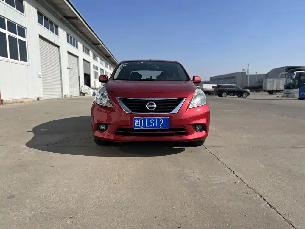 Nissan Sunny 2011 — фото 2
