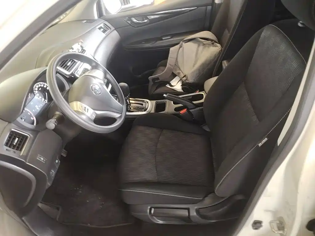 Nissan Tiida 2018 — фото 15