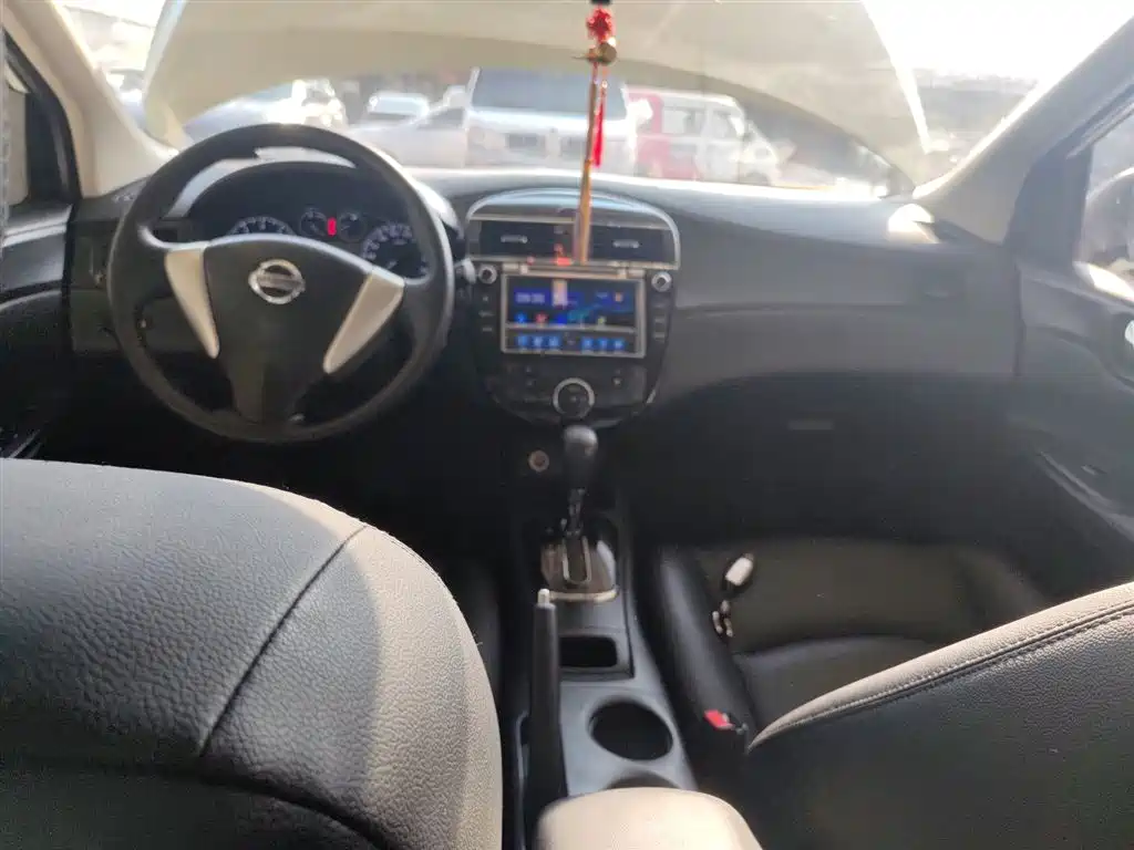 Nissan Tiida 2015 — фото 10