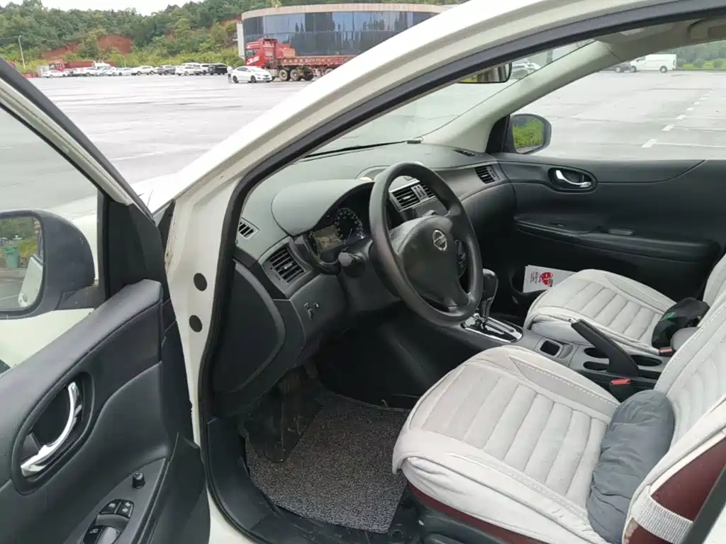 Nissan Tiida 2015 — фото 16